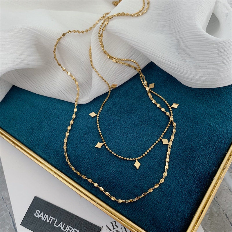 https://latuki.com/cdn/shop/products/18k-gold-filled-layered-necklace-two-strand-choker-double-necklace-set-double-chain-choker-gift-for-her-anti-tarnishwaterproof-jewelry-latuki-383153_800x.jpg?v=1656746736